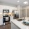 Well-lit kitchen with ample counter space